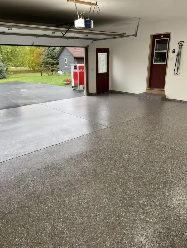 After photo of a Frisco garage with a finished flake epoxy floor coating