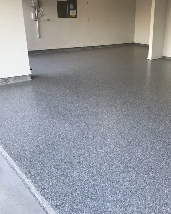 After photo of a McKinney garage with a finished flake epoxy floor coating