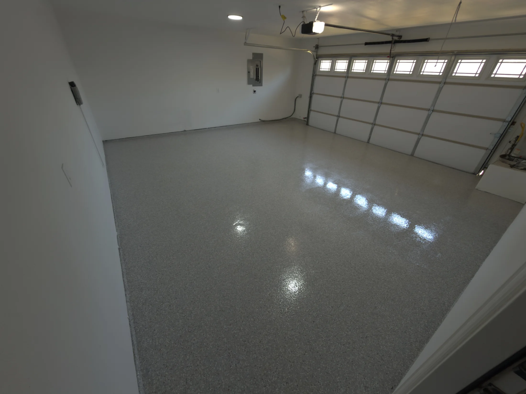 Wide view of a completed garage floor coating in Allen, Texas