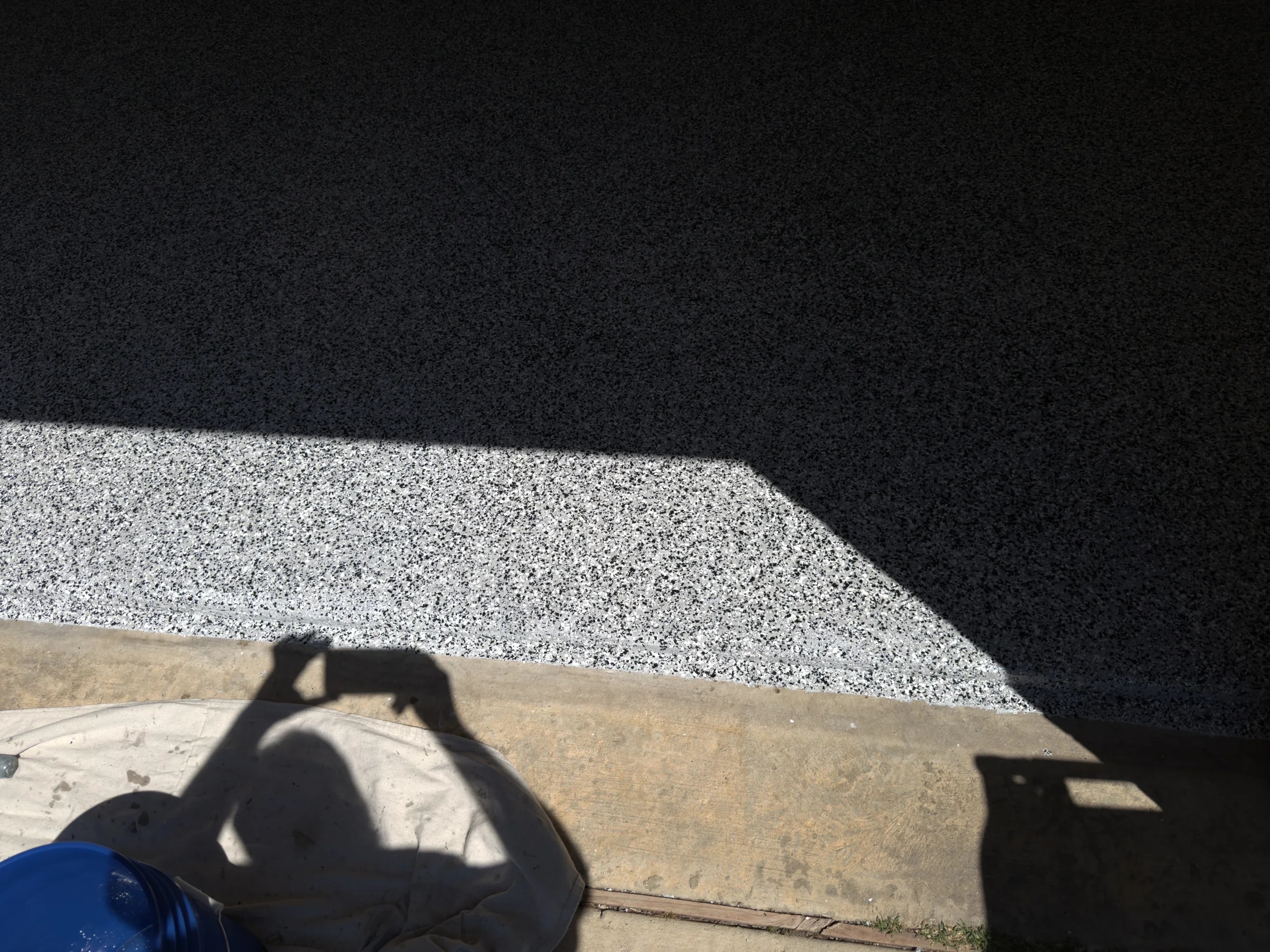 Finished garage floor coating detail in Aubrey, Texas