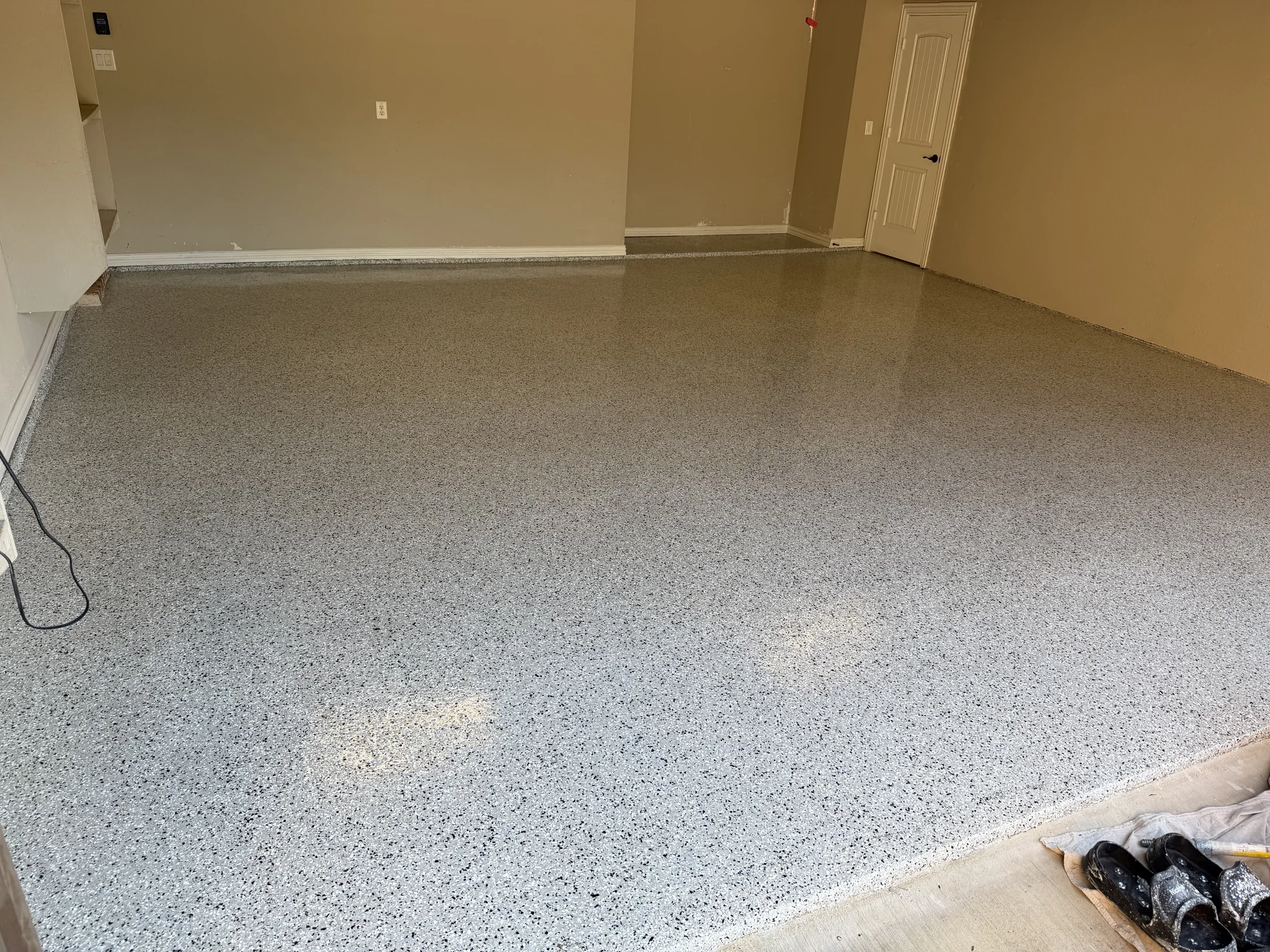 Wide view of a finished garage floor coating in Colleyville, Texas