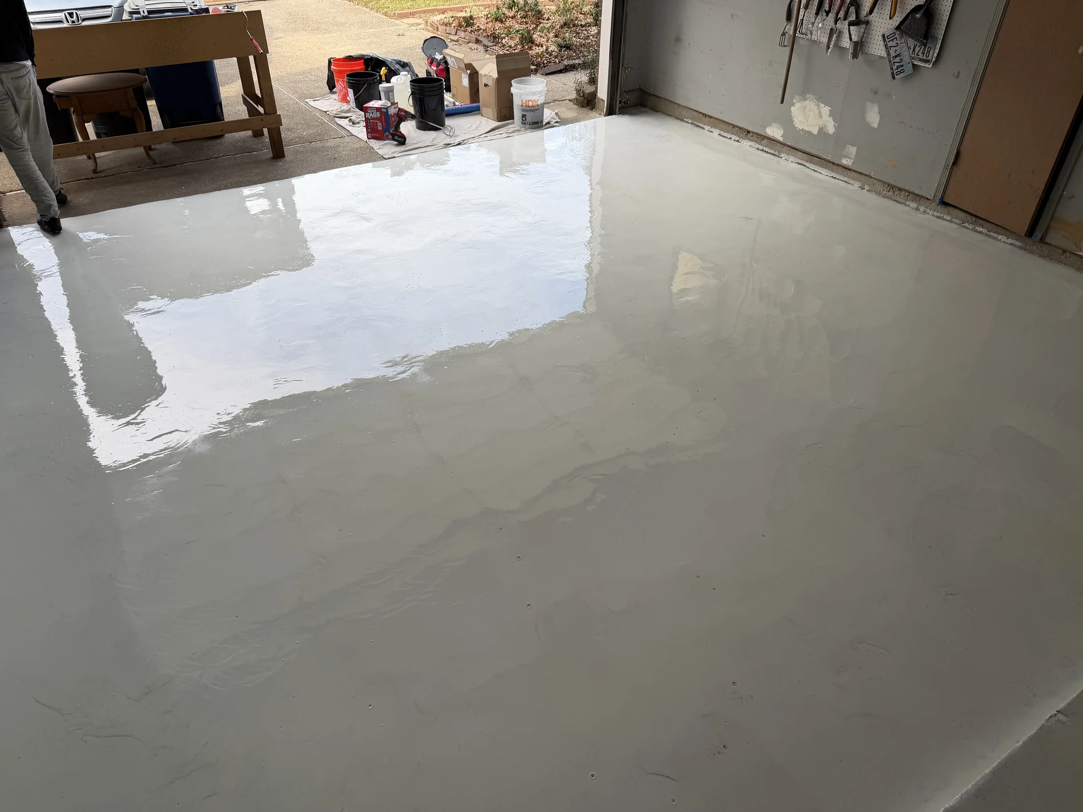 Garage floor moisture vapor barrier application in Euless, Texas