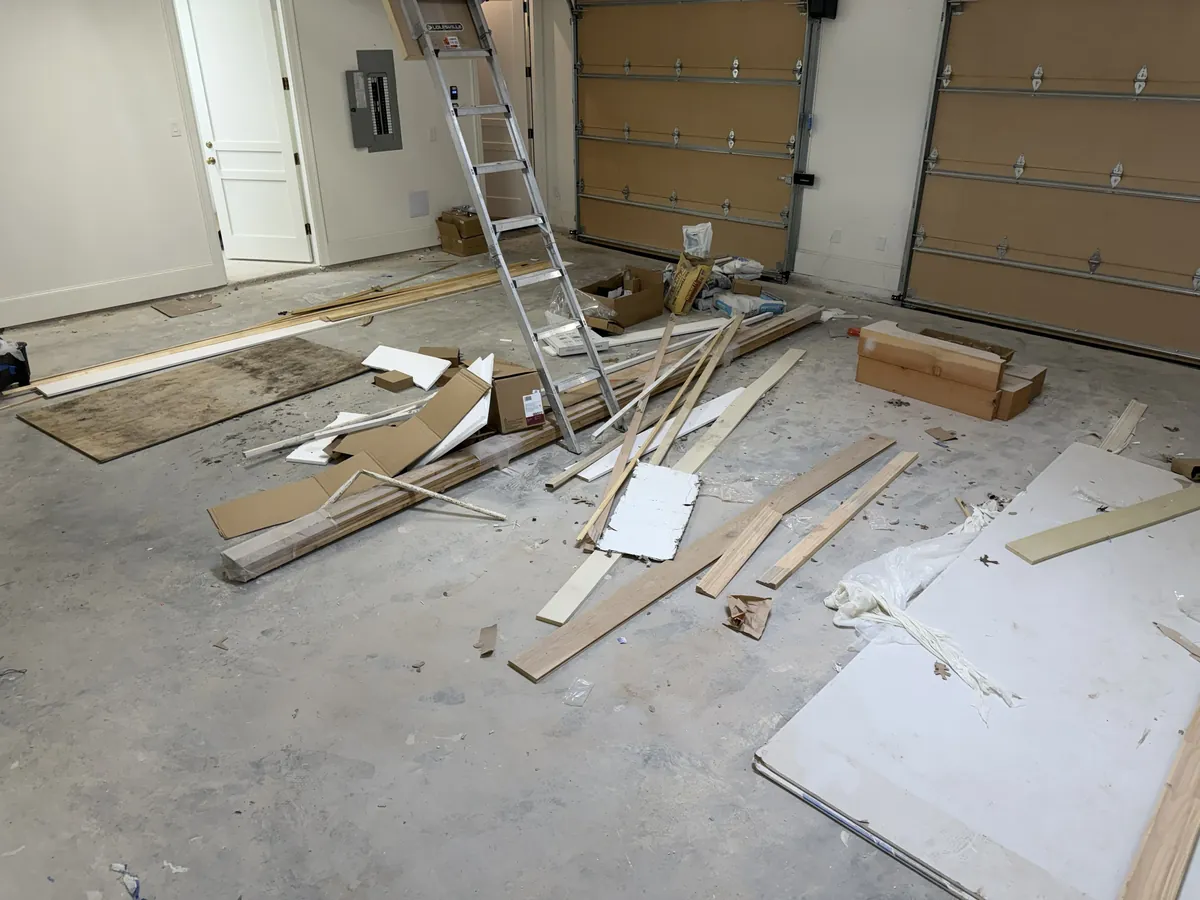 Before photo of a 2-car garage in Fort Worth, Texas before floor coating