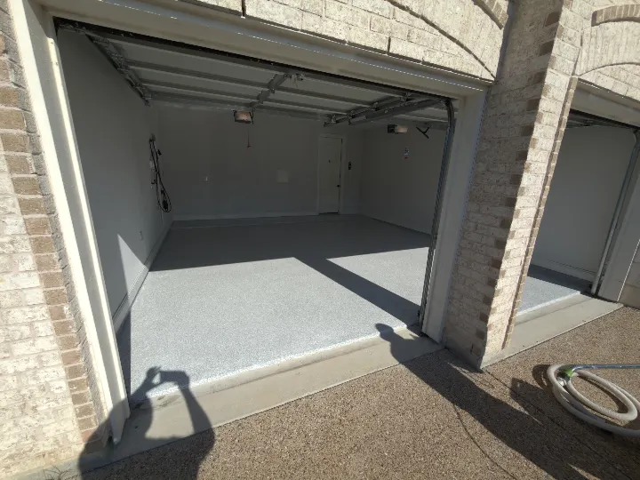 Completed 400 square foot garage floor with Schist flake coating in Roanoke Texas.